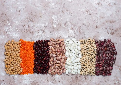 legumes-beans-assortment-different-bowls-light-stone-background-top-view-healthy-vegan-protein-food_2831-896