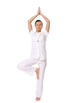 Sport girl doing yoga exercise